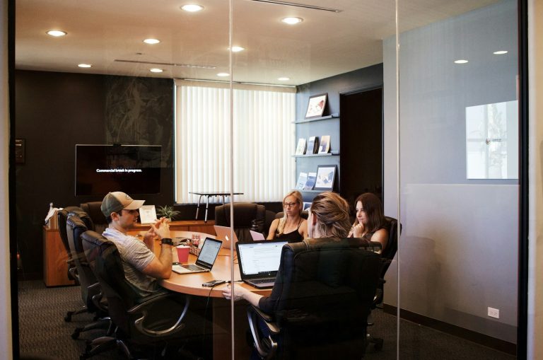 Consulting team reviewing governance documents