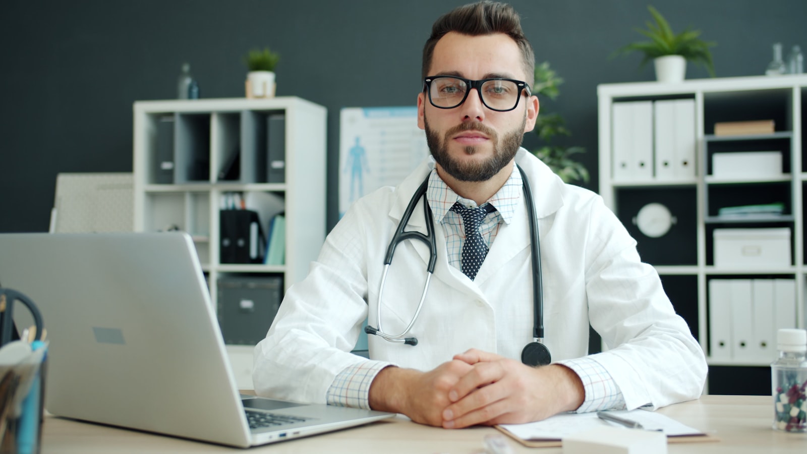 Doctor at desk during a clinical consultation