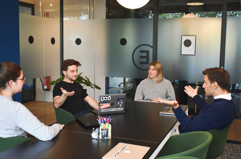 Colleagues discussing risk and governance matters in an office setting